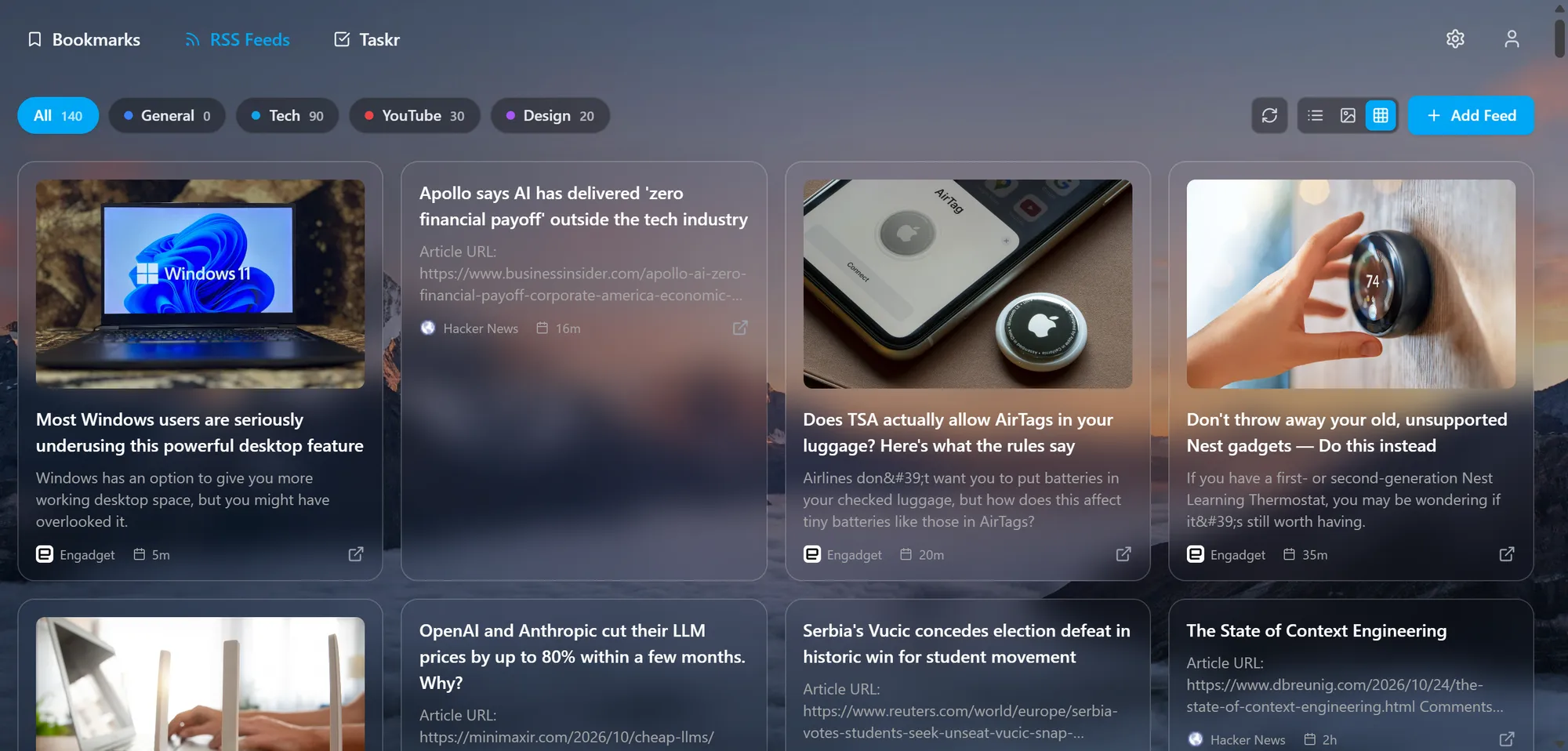 Deskr RSS reader showing all categories with article cards from Engadget and Hacker News